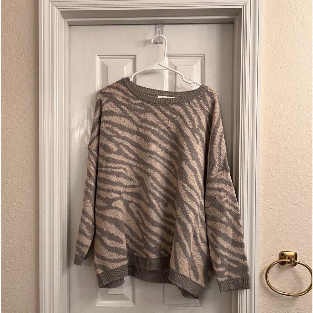 Boutique oversized zebra print sweater.